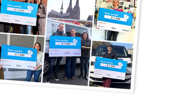 Spendenübergabe von Pixum Mitarbeitenden an gemeinnützige Organisationen