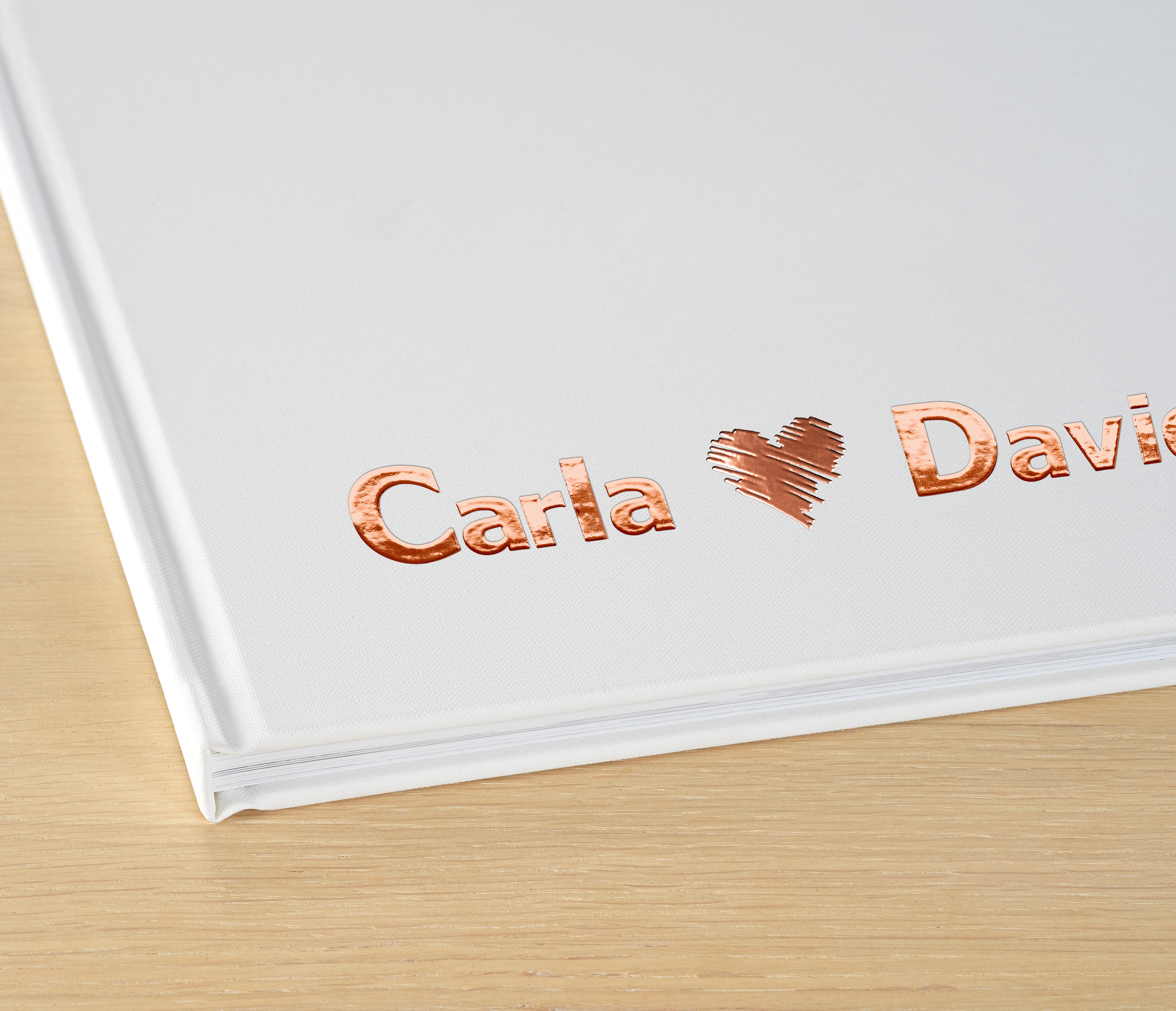 Fotobok med förädlingslack hos Pixum