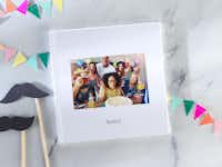 Livre photo Pixum Livre photo avec une photo d'une fête d'anniversaire