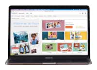 Pixum fotounivers software Udskæring af en Macbook med et skærmbillede af Pixum Fotowelt-softwaren