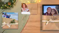 Les produits photo Pixum comme cadeaux de Noël Un livre photo, une déco murale et un calendrier emballés comme cadeaux de Noël