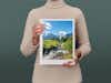 Pixum Fotobuch groß im Hochformat mit einer Schweizer Berglandschaft auf dem Cover