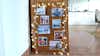 Pixum Fotoabzüge an Wandgitter mit Weihnachtsmotiven