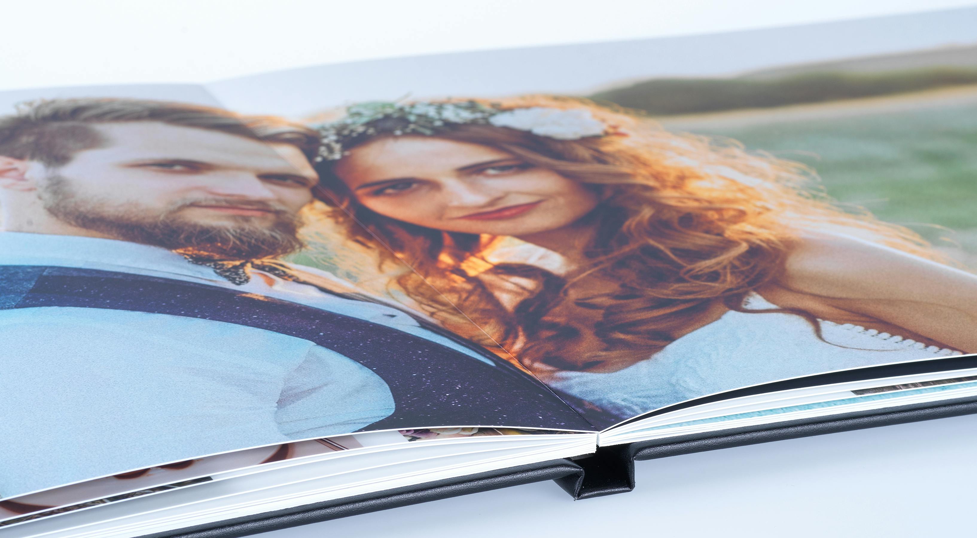 Livre photo Pixum avec couverture en similicuir et une photo de mariage