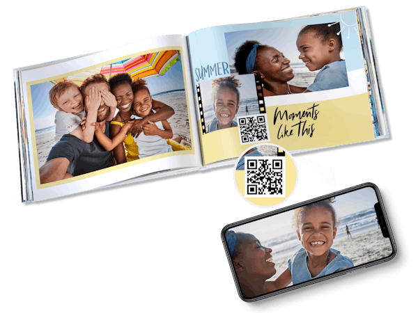 Fotoboek met fimpje en QR code dat op je smartphone kan worden afgespeeld