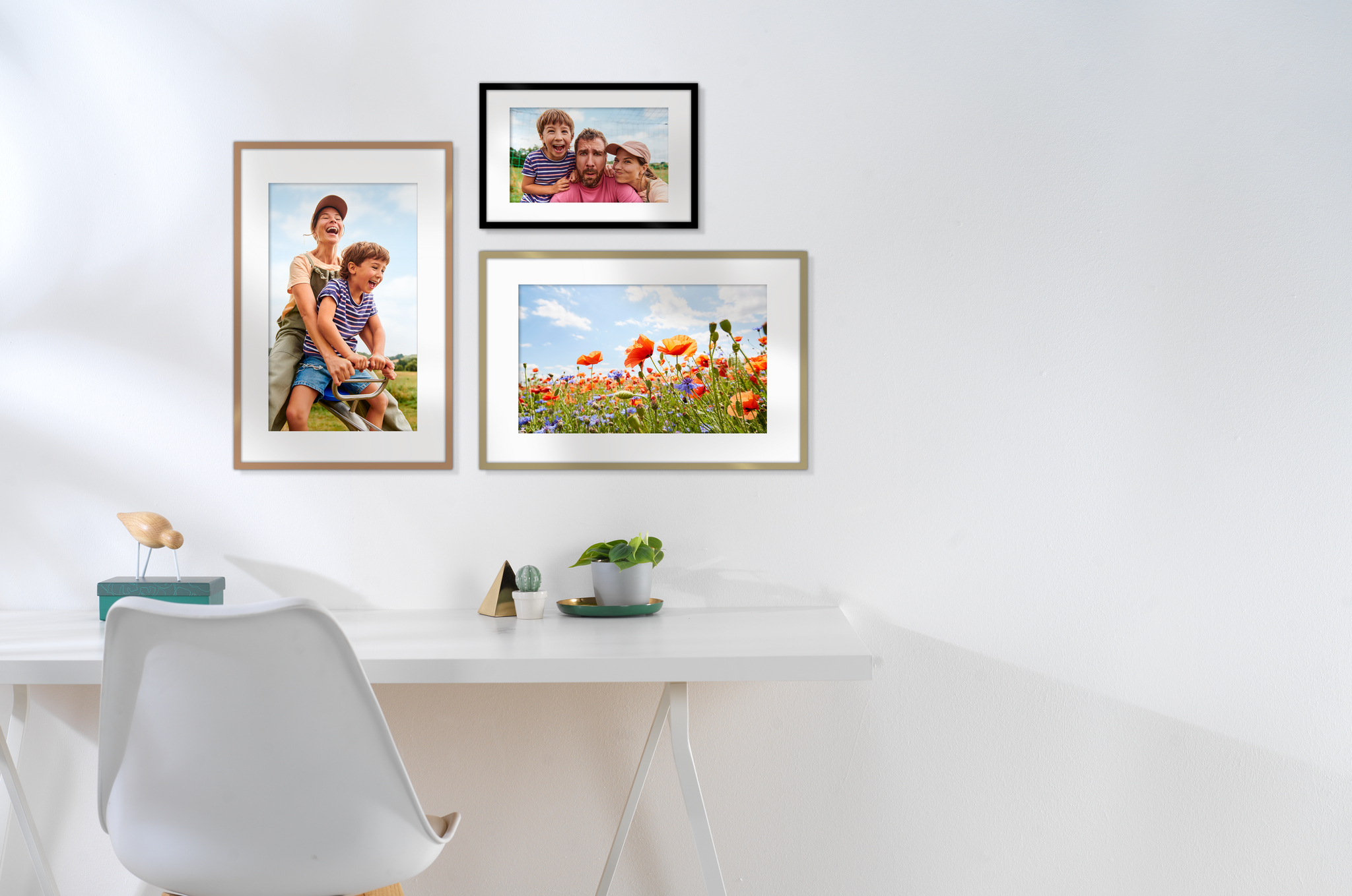 metallic picture frames in black, gold and copper with family images