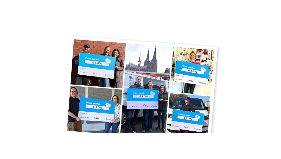 Spendenübergabe von Pixum Mitarbeitenden an gemeinnützige Organisationen