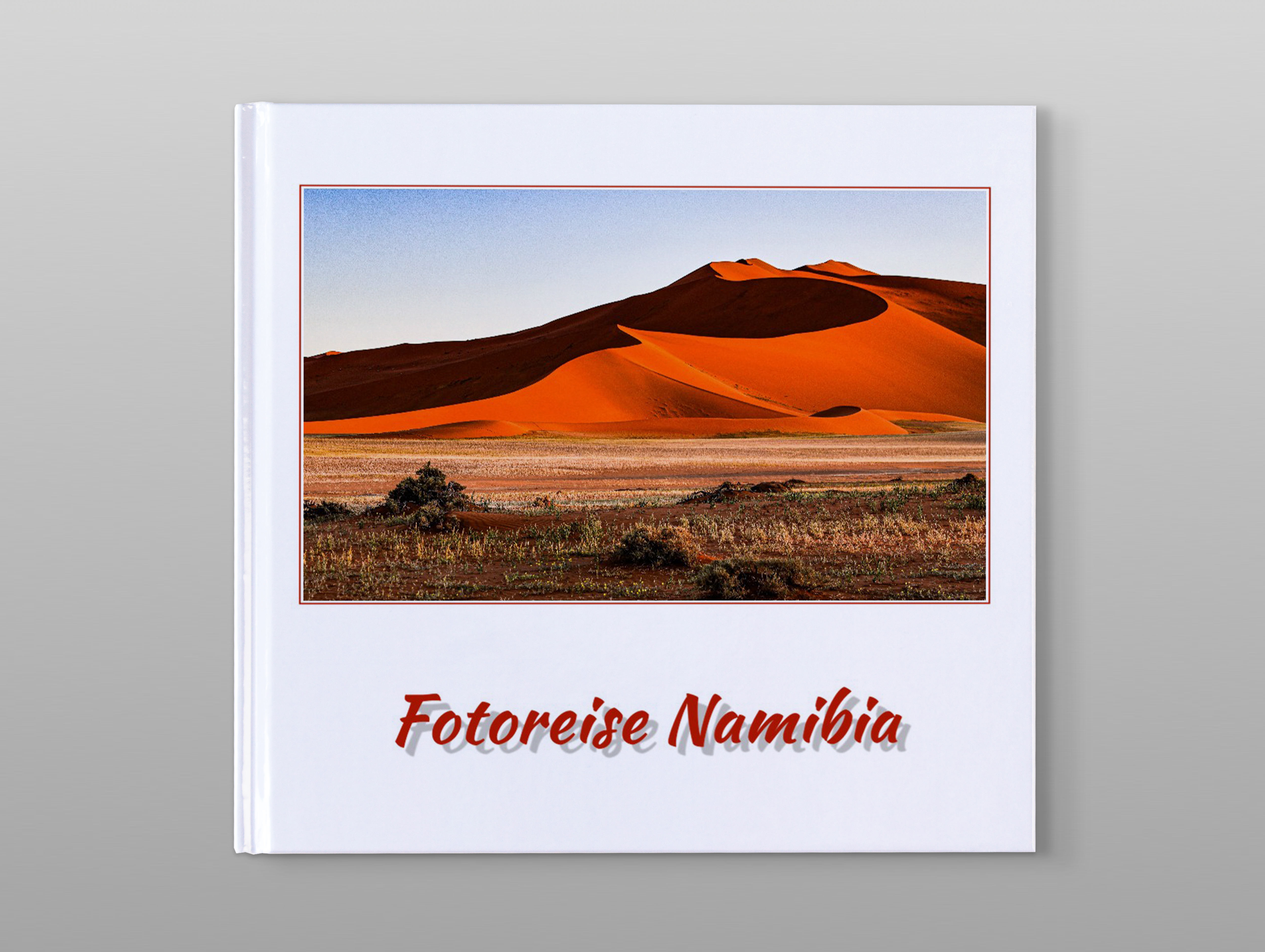 Cover eines Pixum Fotobuch Kundenbeispiels von Namibia vor grauem Hintergrund