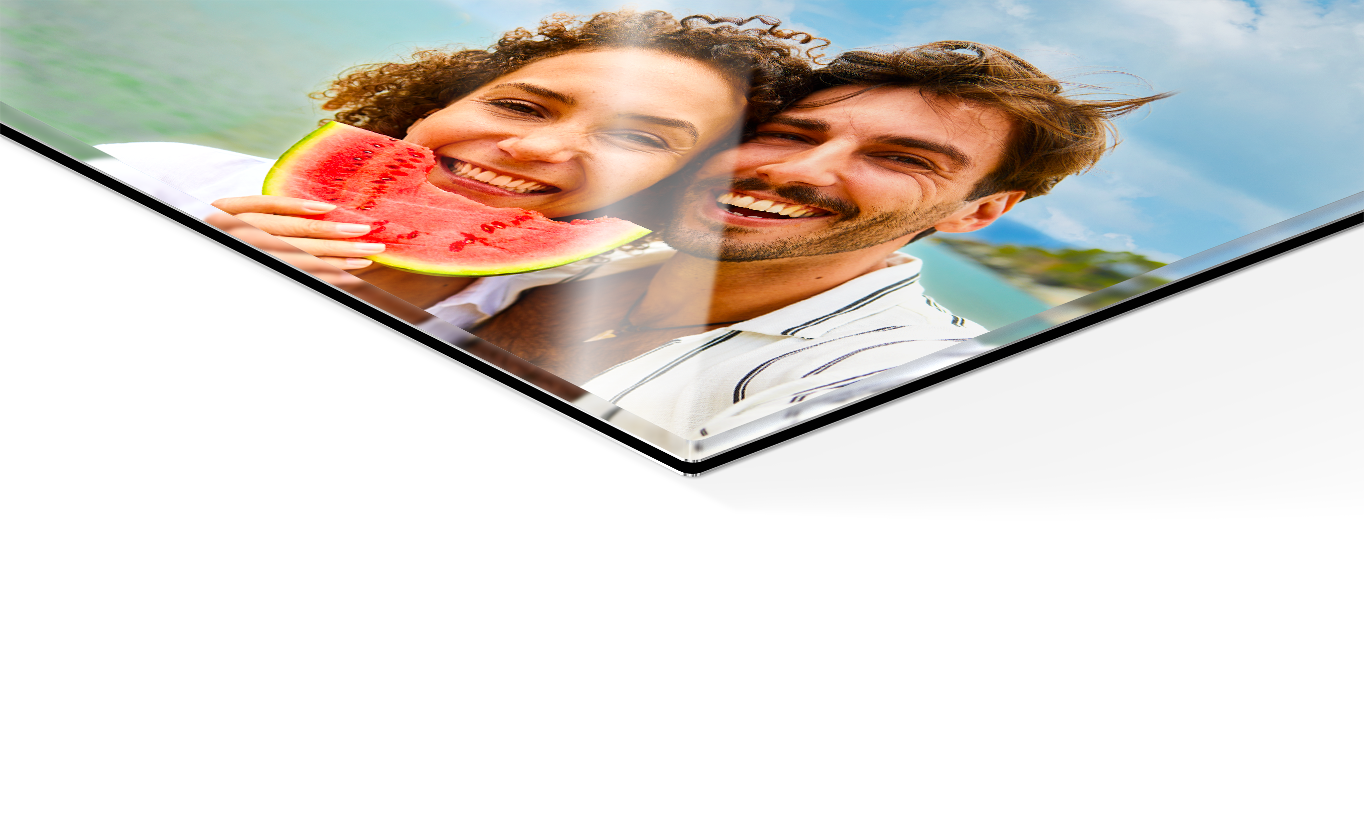 Gallery print detail with image of a couple on the beach with watermelon