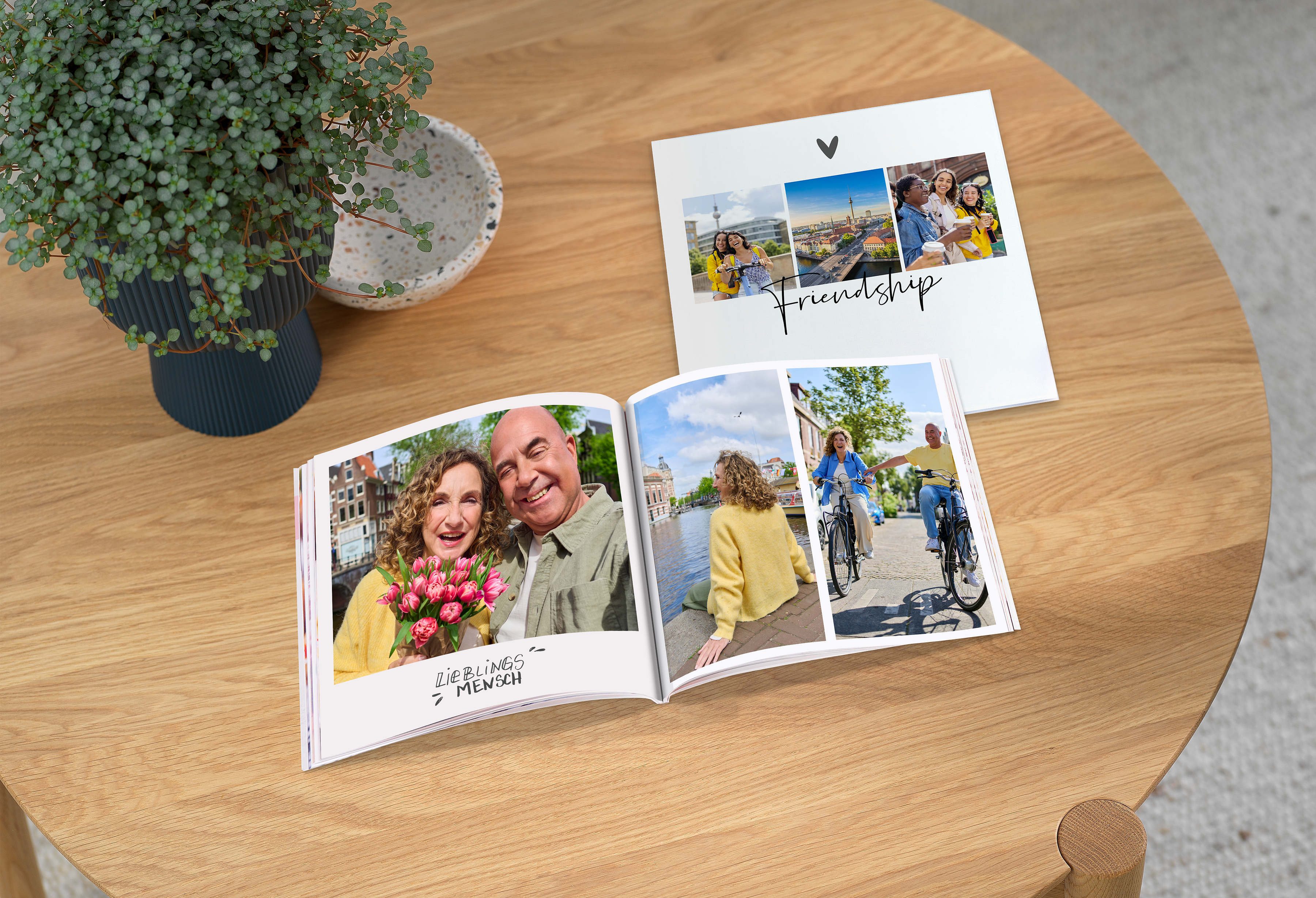 Two pixum photo books on a table.