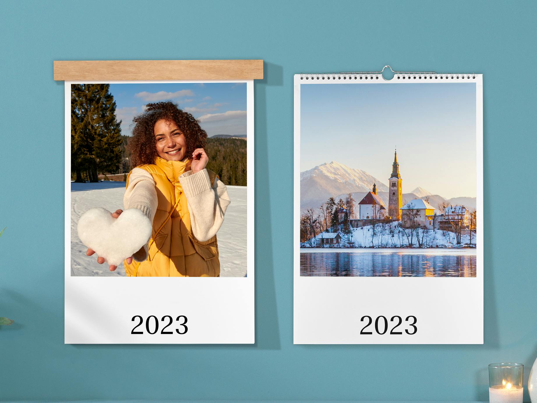 Two wall calendars in portrait format with a winter image on the cover