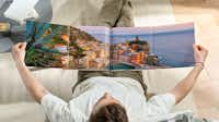Panoramaseite im Pixum Fotobuch Pixum Fotobuch mit einer ausklappbaren Panoramaseite mit einem Landschaftsmotiv