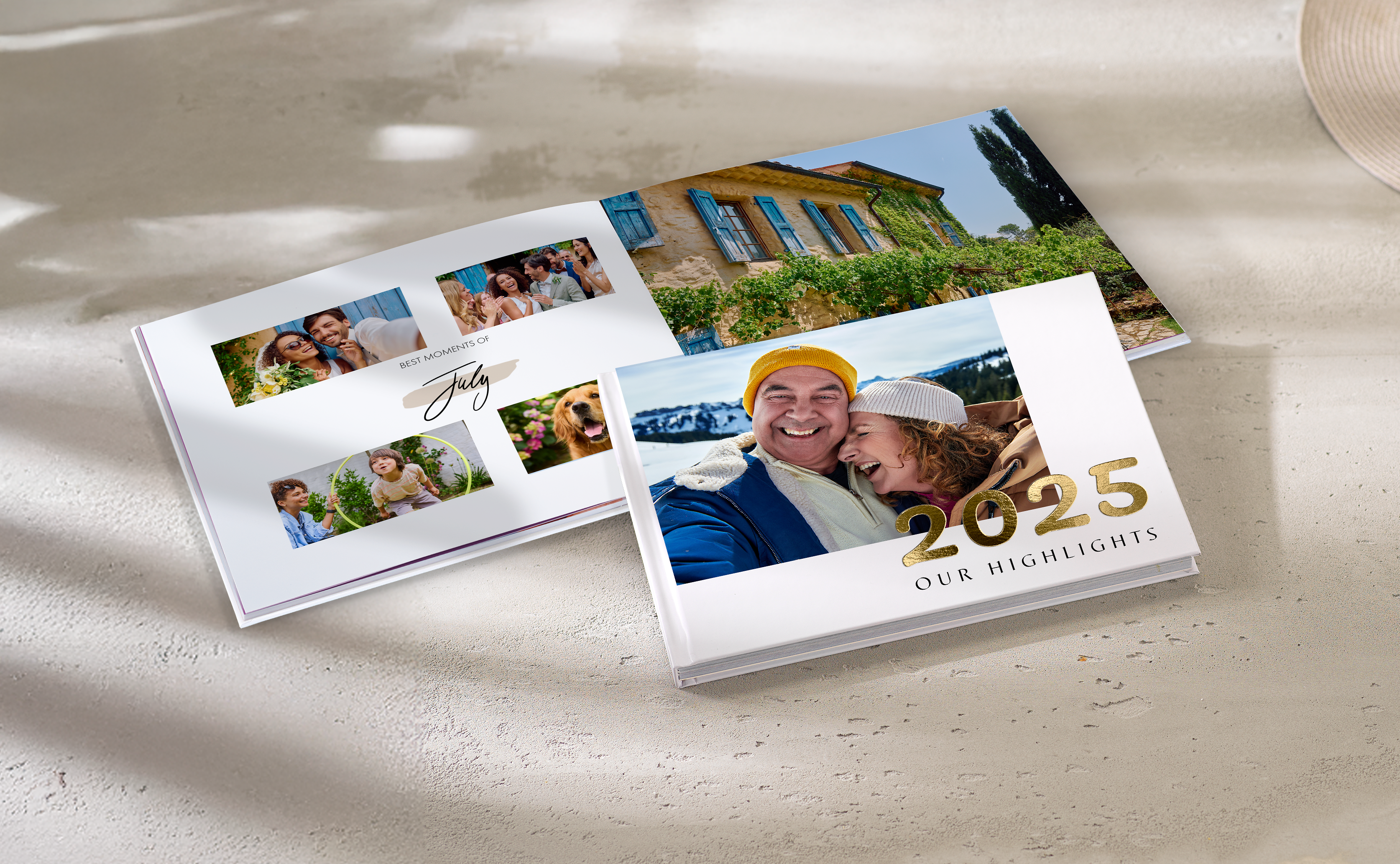 Livre photo ouvert et posé sur une table avec des photos d'un couple en couverture avec le texte "2025 our highlights" .