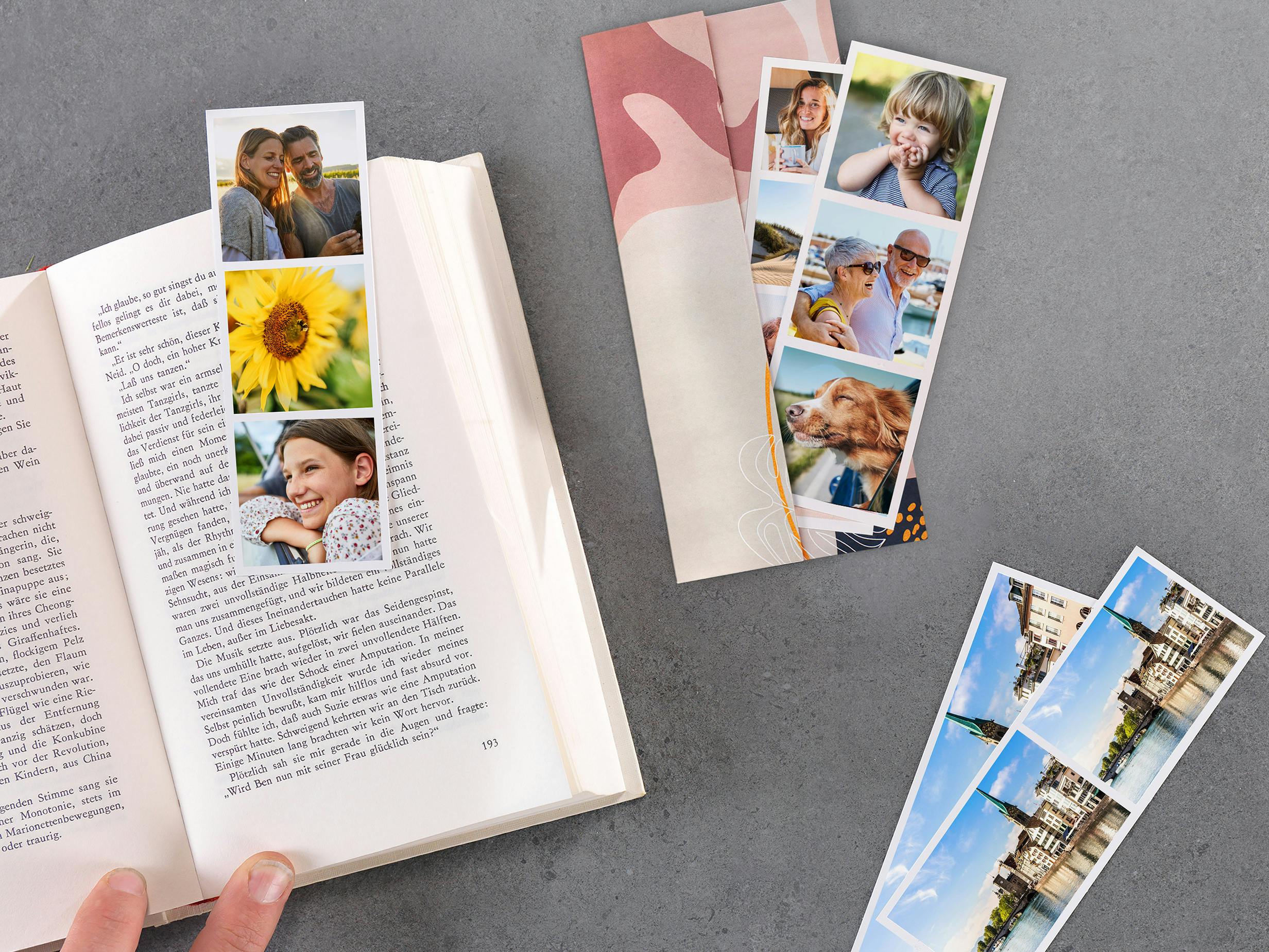 Fotostreifen mit verschiedenen Motiven in einem Buch als Lesezeichen