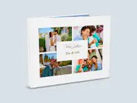 Fotobuch Cover mit Pärchenbildern Aufgestelltes Fotobuch mit einer Collage aus Pärchenbildern auf dem Cover.