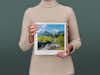 Pixum Fotobuch gross im quadratischen Format mit einer Schweizer Berglandschaft auf dem Cover