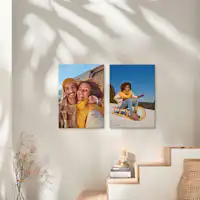 Fotoleinwände im Format 70x50 cm Zwei Fotoleinwände im Format 70x50 cm hängen an einer Wand und zeigen winterliche Bilder von einem gl