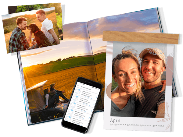 Fotoabzüge, Fotokalender, Fotobuch und ein Smartphone als Freisteller