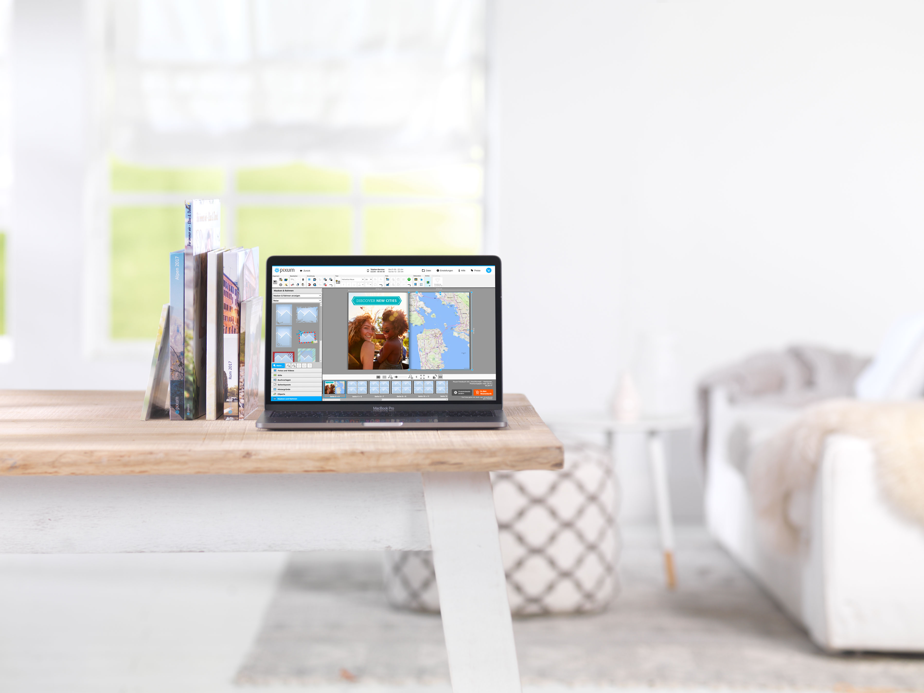 Ordinateur portable avec une fonction de carte géographique dans le logiciel Univers photo Pixum