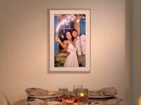 Framed photo with wedding photo Framed photo with wedding photo on a wall