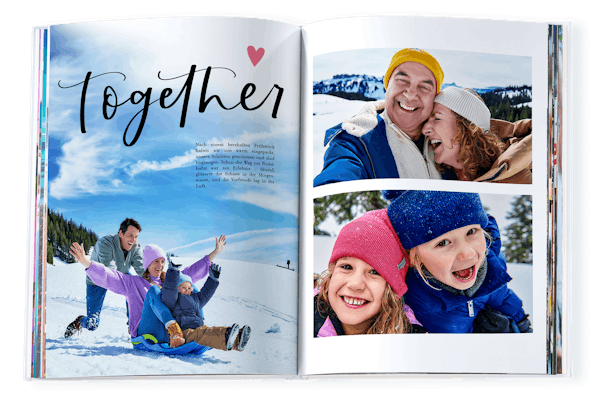 Pixum Fotobuch im Querformat mit kreativem Layout und winterlichen Fotos.