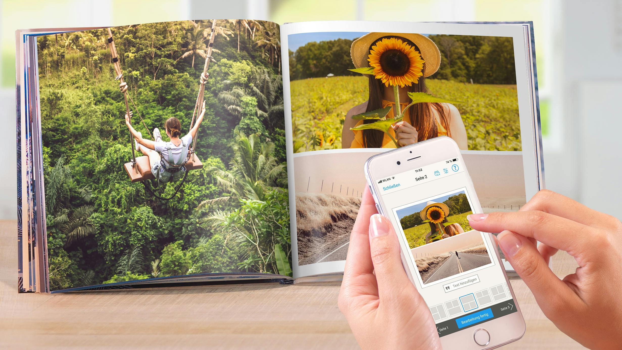 Smartphone mit Pixum-App Benutzeroberfläche und ein aufgeschlagenes Fotobuch im Hintergrund.