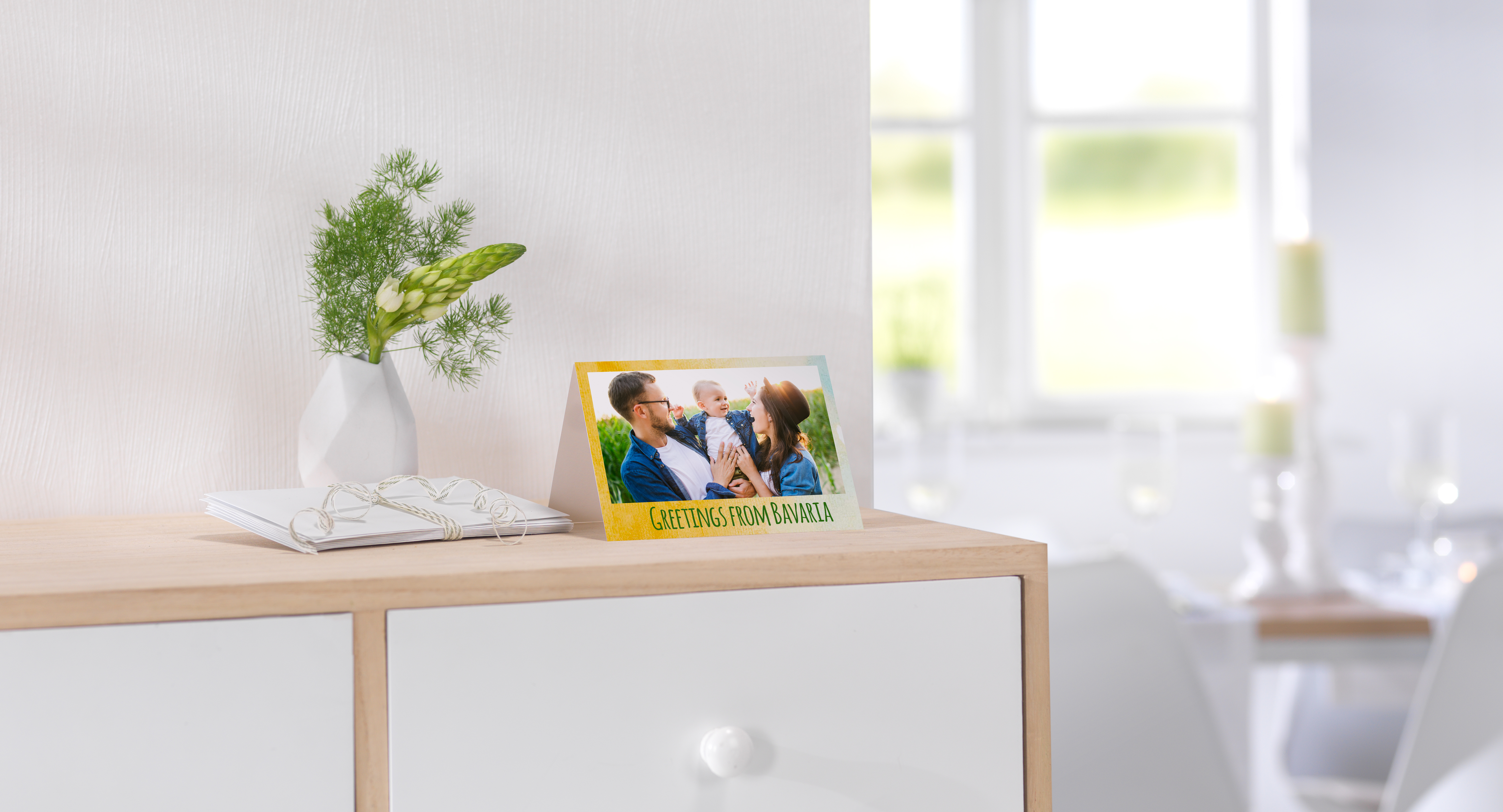 Vouwkaart met een foto van een familie en met de tekst Grüße aus Bayern