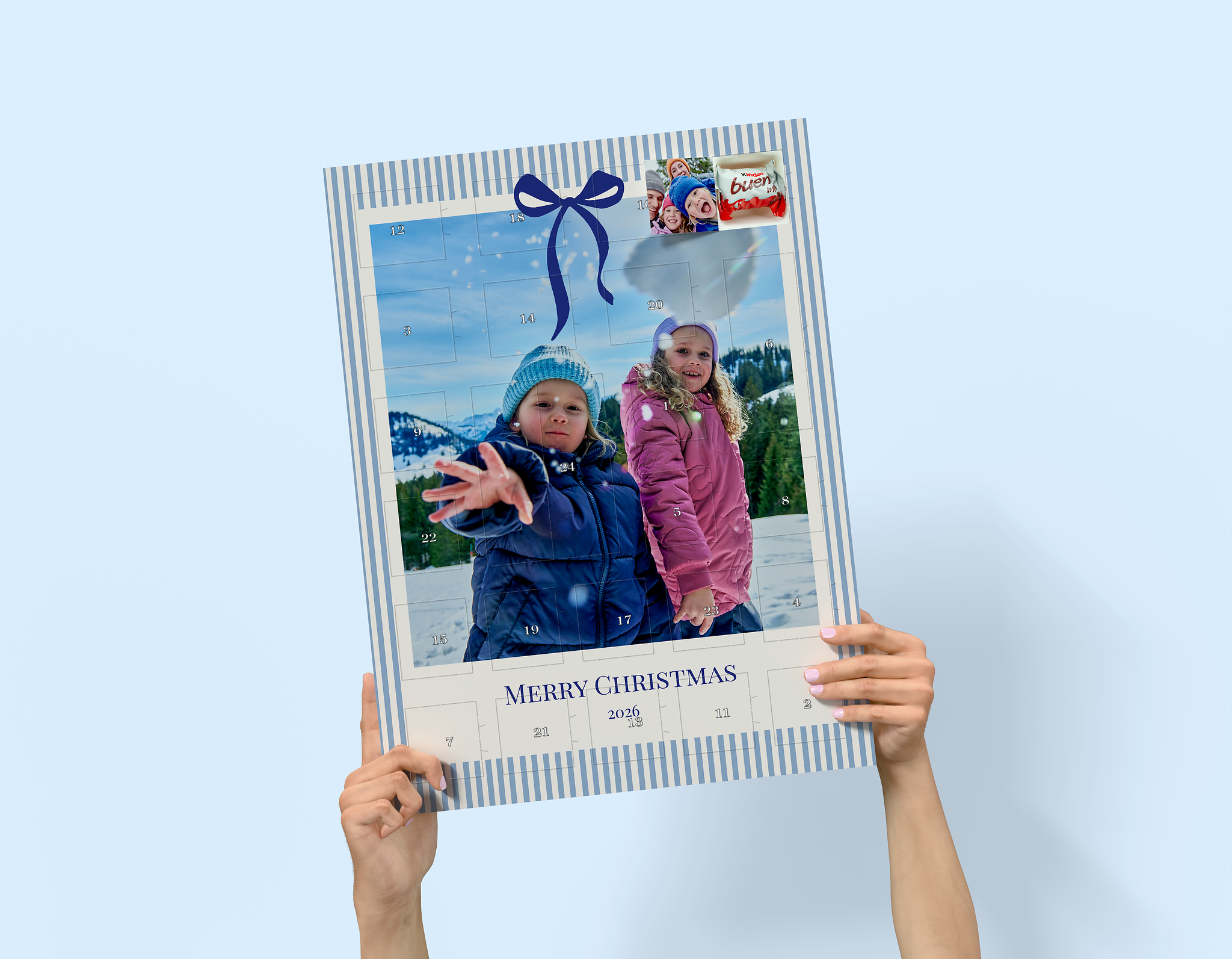 Calendrier de l’Avent avec chocolats Kinder et fenêtres photo.