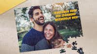 Puzzel maken Een deels voltooide puzzel met daarop de tekst "tegoedbon voor een spannend weekendje weg".