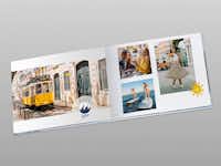 Modèle de design pour un album photo de voyage Un album photo de voyage ouvert, avec un modèle de design et des photos de Barcelone.