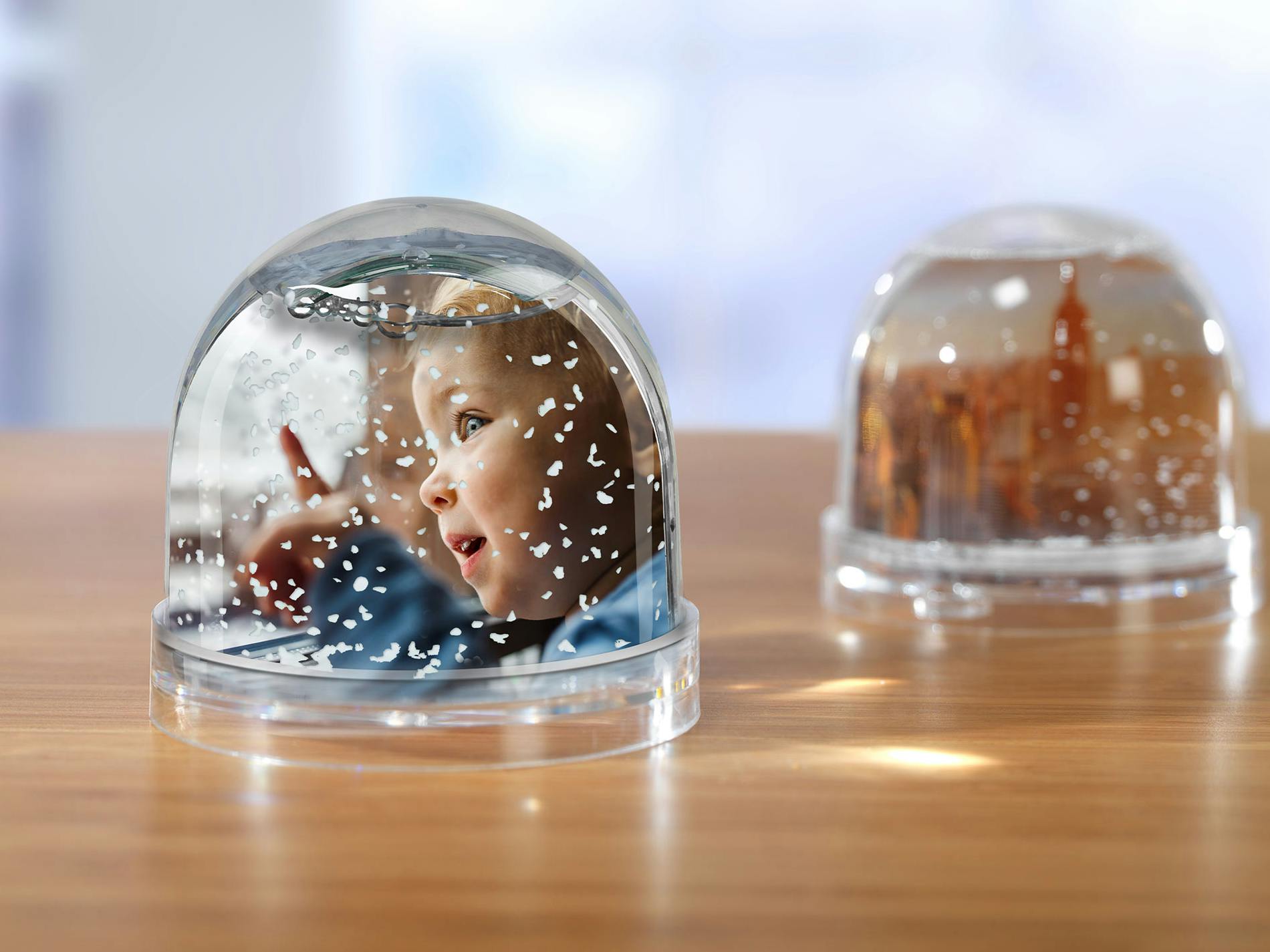 Bola de nieve personalizada con una foto de un niño pequeño