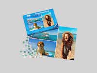 Ravensburger Fotopuzzle mit 500 Teilen Ein Fotopuzzle mit eine Collage aus mehreren Fotos. Das Puzzle ist von der Marke Ravensburger und Pixum hat 500 Teile. Neben dem Fotopuzzle liegt die Box.