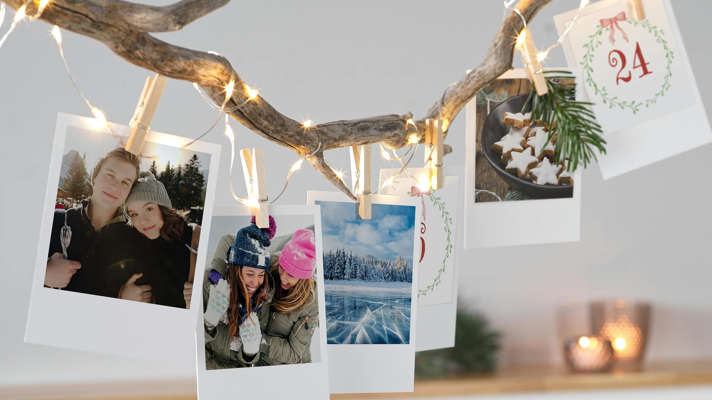 Julekalender med retro-fotos med en lyskæde på en gren