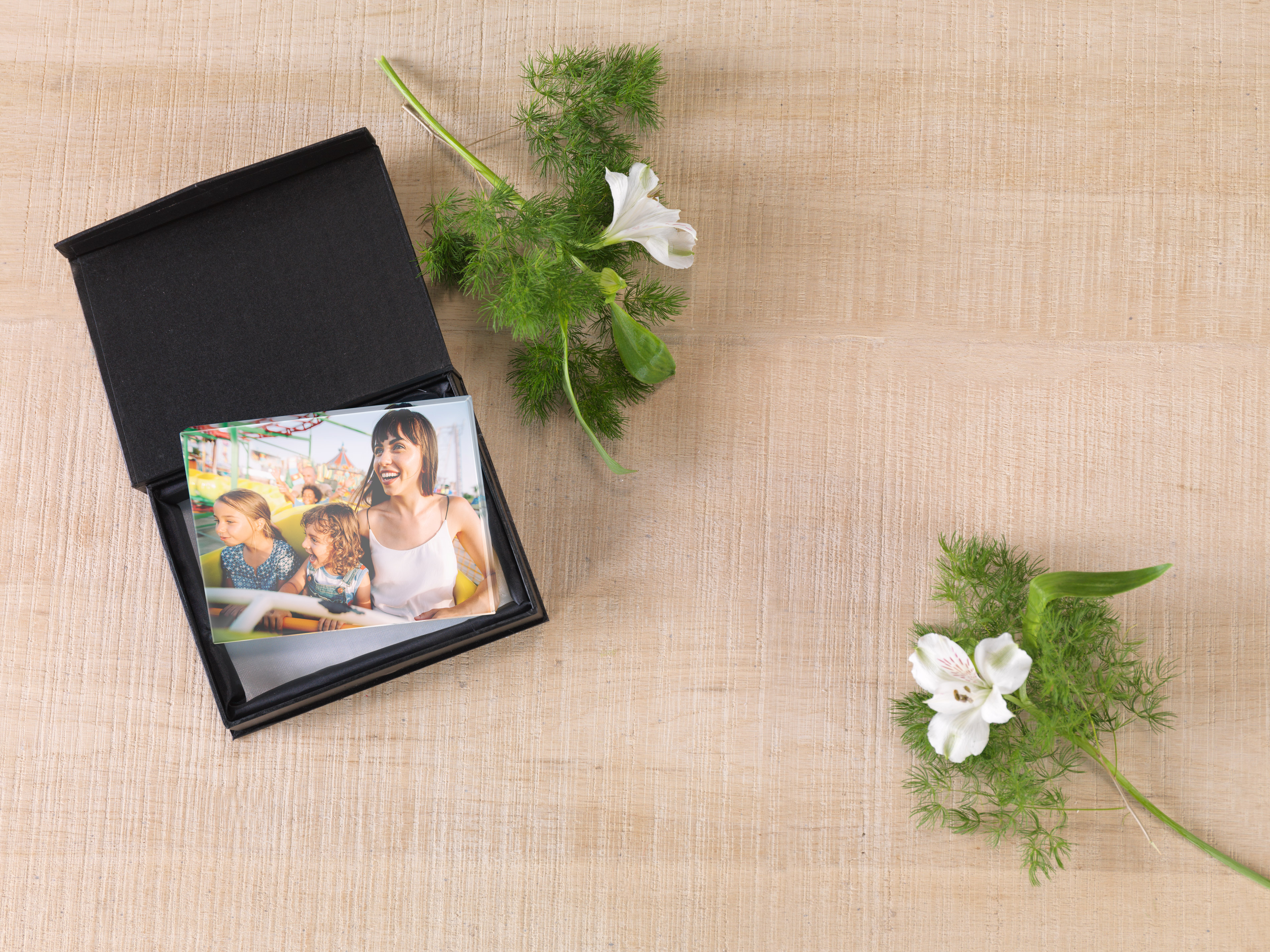 Foto en cristal con la foto de una familia