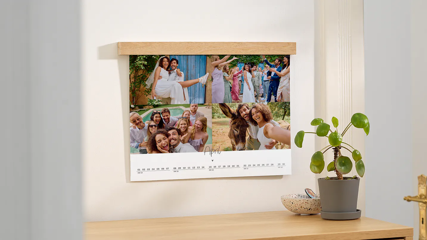 Pixum wall calendar in A3 format with a collage Pixum wall calendar in A3 format with a collage