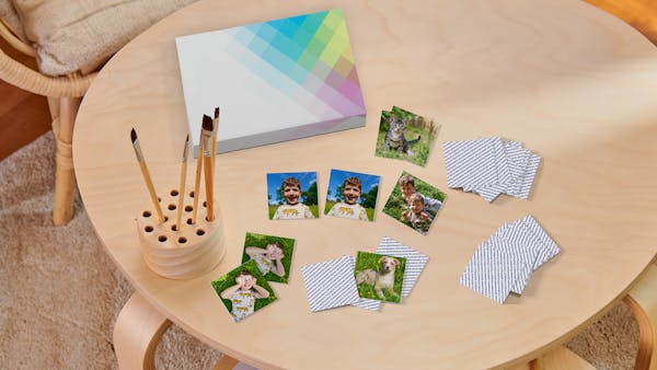 Photo memo Memo game with photos pf children, a dog and a cat.