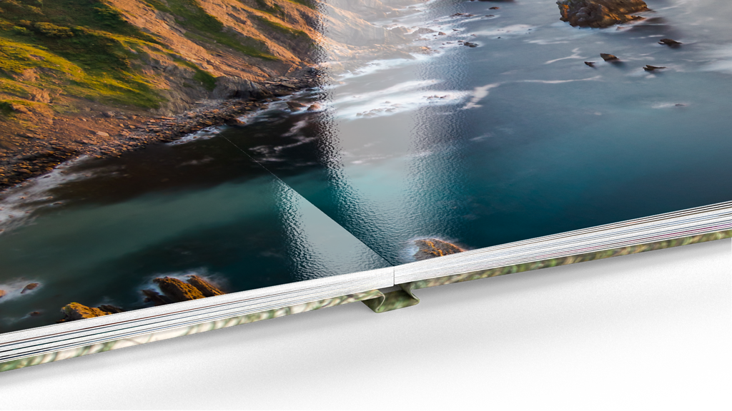 Detailansicht eines Pixum Fotobuches mit Fotopapier glänzend und Layflat-Bindung